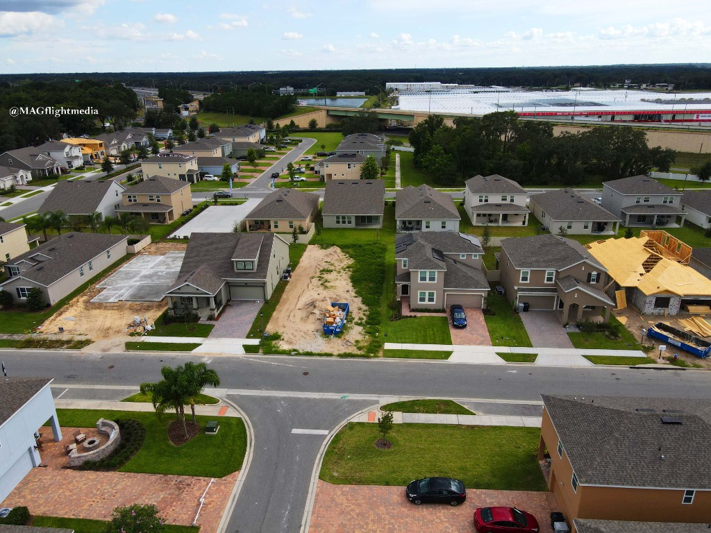 Aerial view of Florida suburban residential development with new construction and rental properties